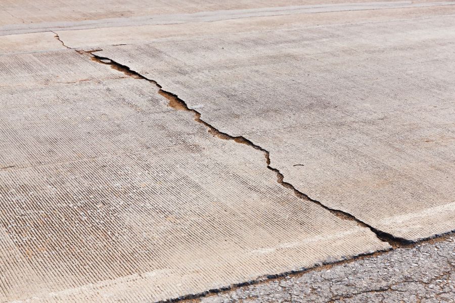 What Causes Concrete Sidewalks to Crack, Sink, and Heave?